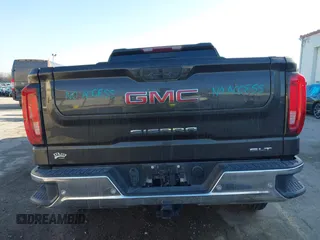 2021 GMC Sierra 1500 SLT z VIN 3GTU9DED9MG176881, wystawiony jako IAAI lot #41140356 z przebiegiem 21 553 mil mil oraz . Historia ofert i sprzedaży dostępna na DreamBid. Obrazek 17.
