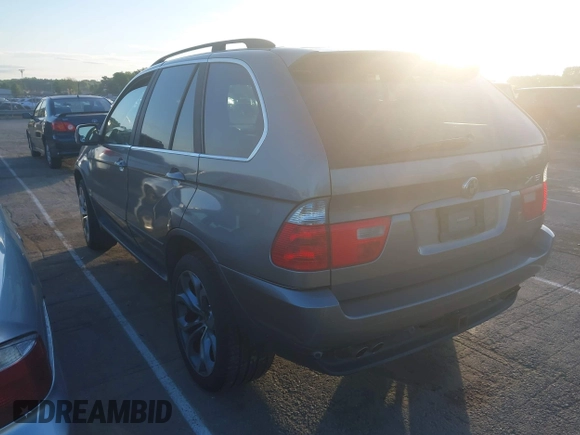 2004 BMW X5 4.4i with VIN 5UXFB53514LV09431, listed as a IAAI auction lot 42142099 with 181,951 mi miles. Bid and sale history available at carsss.com. Image 3.