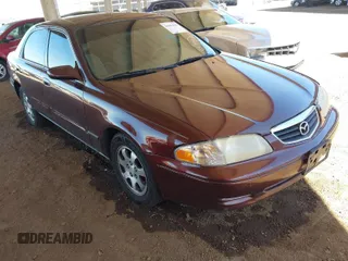 2002 Mazda 626 LX with VIN 1YVGF22C225291987, listed as a IAAI auction lot 41863018 with 111,362 mi miles. Bid and sale history available at carsss.com. Image 1.
