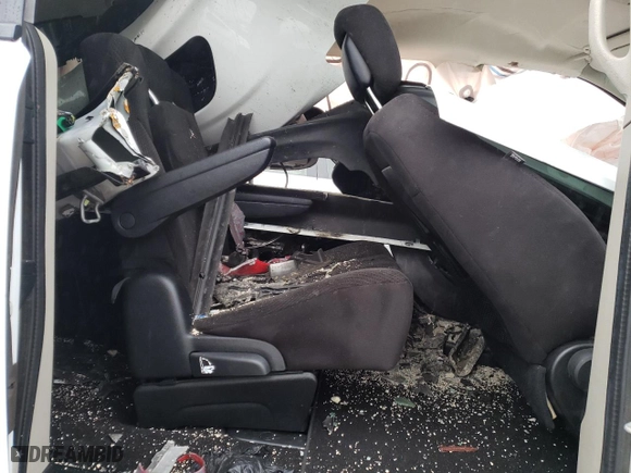 2014 Dodge Grand Caravan SE with VIN 2C4RDGBG0ER473442, listed as a Copart auction lot 49376295 with 106,092 mi miles and Salvage Title. Bid and sale history available at carsss.com. Image 10.