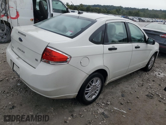 2010 Ford Focus SE with VIN 1FAHP3FN5AW293143, listed as a Copart auction lot 71112144 with 196,239 mi miles and Salvage Title. Bid and sale history available at DreamBid. Image 3.