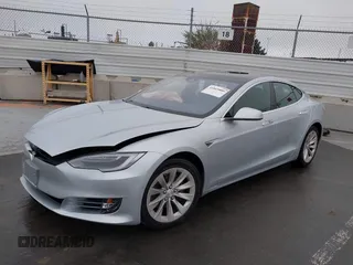 2016 Tesla Model S 70 with VIN 5YJSA1E17GF156514, listed as a IAAI auction lot 41869006 with 17,704 mi miles and . Bid and sale history available at DreamBid. Image 20.