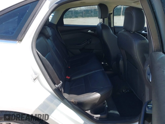 2015 Ford Focus Titanium с VIN 1FADP3J27FL341102, выставлен на аукционе IAAI как лот 41793450 с пробегом 96 465 миль миль и . История ставок и продаж доступна на DreamBid. Изображение 8.