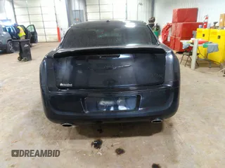 2014 Chrysler 300 S with VIN 2C3CCABG2EH343503, listed as a IAAI auction lot 40934463 with 128,876 mi miles and . Bid and sale history available at carsss.com. Image 16.