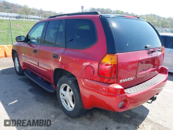 2005 GMC Envoy SLT with VIN 1GKDS13SX52144959, listed as a IAAI auction lot 41968495 with 238,199 mi miles. Bid and sale history available at carsss.com. Image 3.