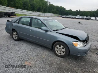 2000 Toyota Avalon XL with VIN 4T1BF28B2YU045935, listed as a Copart auction lot 57147225 with 164,261 mi miles and Salvage title. Bid and sale history available at DreamBid. Image 4.