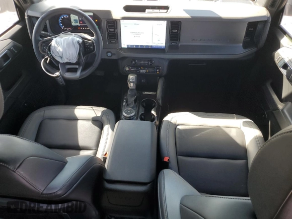 2024 Ford Bronco Big Bend with VIN 1FMDE7BH5RLA24042, listed as a Copart auction lot 76699044 with 13,419 mi miles and Salvage Title. Bid and sale history available at DreamBid. Image 8.