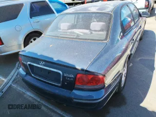 2002 Hyundai Sonata GLS with VIN KMHWF35H12A702457, listed as a Copart auction lot 60985574 with 99,698 mi miles and Salvage Title. Bid and sale history available at carsss.com. Image 6.