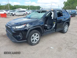 2021 Toyota RAV4 LE with VIN 2T3F1RFV9MC254808, listed as a IAAI auction lot 42326876 with 71,560 mi miles and . Bid and sale history available at DreamBid. Image 2.