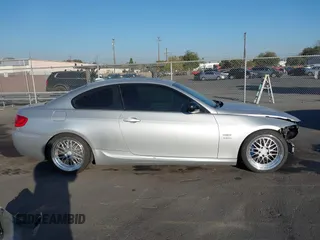 2011 BMW 3 Series 335is with VIN WBAKG1C57BE618727, listed as a IAAI auction lot 41234102 with 154,007 mi miles and . Bid and sale history available at carsss.com. Image 13.