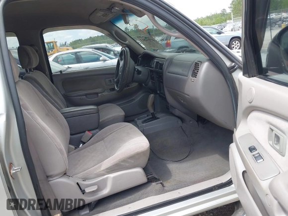 2003 Toyota Tacoma PreRunner z VIN 5TEGN92N23Z218412, wystawiony jako IAAI lot #41994813 z przebiegiem 334 799 mil mil oraz . Historia ofert i sprzedaży dostępna na DreamBid. Obrazek 5.