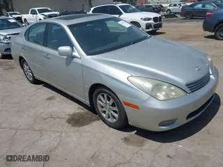 2004 Lexus ES 330 with VIN JTHBA30G745005515, listed as a IAAI auction lot 42077548 with 124,123 mi miles. Bid and sale history available at carsss.com. Image 1.