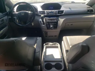 2012 Honda Odyssey Touring with VIN 5FNRL5H94CB009952, listed as a Copart auction lot 54322695 with 135,551 mi miles and Salvage title. Bid and sale history available at DreamBid. Image 8.