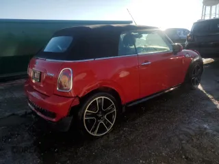 2010 MINI Convertible S z VIN WMWMS3C52ATZ85466, wystawiony jako Copart lot #81320914 z przebiegiem 143 183 mil mil oraz Szkoda całkowita • Salvage title. Historia ofert i sprzedaży dostępna na DreamBid. Obrazek 3.