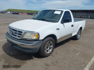1999 Ford F-150 Work Series with VIN 2FTZF1729XCA83871, listed as a IAAI auction lot 42009506 with 234,988 mi miles. Bid and sale history available at carsss.com. Image 19.