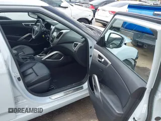 2015 Hyundai Veloster z VIN KMHTC6AD8FU222744, wystawiony jako IAAI lot #42129397 z przebiegiem Nie podano mil oraz . Historia ofert i sprzedaży dostępna na DreamBid. Obrazek 5.