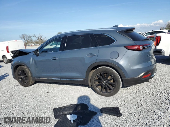 2021 Mazda CX-9 Grand Touring with VIN JM3TCADY1M0517525, listed as a Copart auction lot 43868965 with 123,602 mi miles and Salvage title. Bid and sale history available at DreamBid. Image 2.