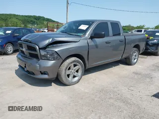 2012 Ram 1500 Express with VIN 1C6RD7FT1CS264737, listed as a IAAI auction lot 42343855 with 148,368 mi miles and . Bid and sale history available at DreamBid. Image 2.