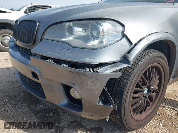 2012 BMW X5 50i with VIN 5UXZV8C56CL426081, listed as a IAAI auction lot 42084071 with 135,473 mi miles and . Bid and sale history available at DreamBid. Image 6.
