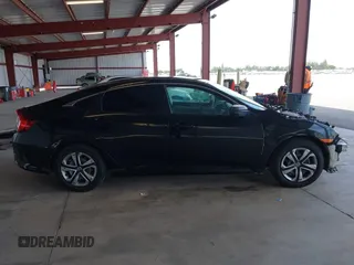 2018 Honda Civic LX with VIN 2HGFC2F53JH605760, listed as a IAAI auction lot 42032200 with 217,239 mi miles and . Bid and sale history available at DreamBid. Image 14.