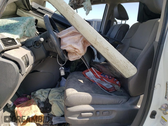 2015 Honda Odyssey Touring Elite z VIN 5FNRL5H90FB033511, wystawiony jako Copart lot #67718683 z przebiegiem Nie podano mil oraz Szkoda całkowita • Salvage title. Historia ofert i sprzedaży dostępna na DreamBid. Obrazek 7.