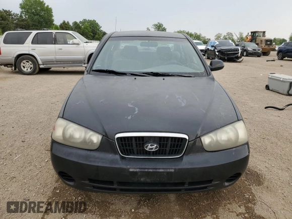 2003 Hyundai Elantra GLS z VIN KMHDN45D63U594320, wystawiony jako Copart lot #58742565 z przebiegiem 163 772 mil mil oraz Szkoda całkowita • Salvage title. Historia ofert i sprzedaży dostępna na DreamBid. Obrazek 5.