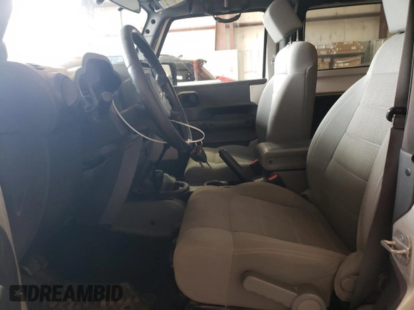 2007 Jeep Wrangler Rubicon z VIN 1J8GA64117L187431, wystawiony jako Copart lot #61293624 z przebiegiem 263 459 mil mil oraz Szkoda całkowita • Salvage title. Historia ofert i sprzedaży dostępna na DreamBid. Obrazek 7.