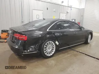 2015 Audi A8 4.0T z VIN WAUJ2AFD5FN009882, wystawiony jako Copart lot #84222704 z przebiegiem 56 118 mil mil oraz Czysty tytuł • Clean title. Historia ofert i sprzedaży dostępna na DreamBid. Obrazek 3.