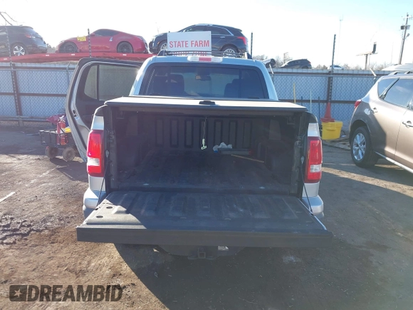 2010 Ford Explorer Sport Trac XLT z VIN 1FMEU3BE6AUF01646, wystawiony jako IAAI lot #41646440 z przebiegiem 58 473 mil mil oraz . Historia ofert i sprzedaży dostępna na DreamBid. Obrazek 17.