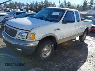 2000 Ford F-150 XL with VIN 1FTRX18W9YNB14241, listed as a IAAI auction lot 41494972 with Not provided miles and . Bid and sale history available at DreamBid. Image 2.