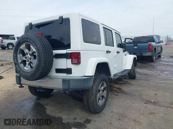 2017 Jeep Wrangler Unlimited Sahara with VIN 1C4BJWEG3HL752719, listed as a IAAI auction lot 41892600 with 127,486 mi miles. Bid and sale history available at carsss.com. Image 4.