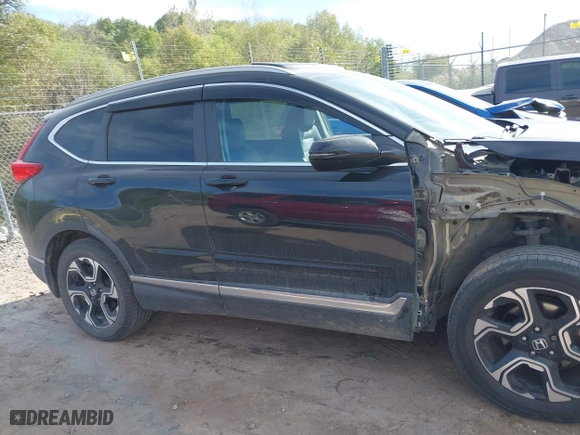 2017 Honda CR-V Touring with VIN 5J6RW2H96HL037854, listed as a IAAI auction lot 40472748 with 126,582 mi miles. Bid and sale history available at carsss.com. Image 13.