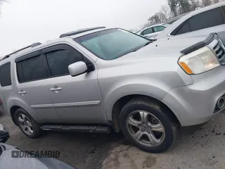 2013 Honda Pilot EX-L with VIN 5FNYF3H75DB012205, listed as a IAAI auction lot 41797084 with 181,577 mi miles and . Bid and sale history available at DreamBid. Image 13.