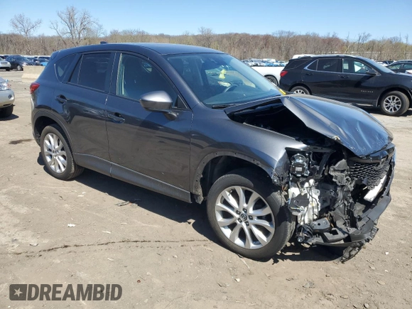 2014 Mazda CX-5 Grand Touring with VIN JM3KE4DY4E0422739, listed as a Copart auction lot 53234745 with 54,152 mi miles and Salvage Title. Bid and sale history available at carsss.com. Image 4.