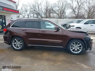 2015 Jeep Grand Cherokee Summit with VIN 1C4RJFJT7FC840560, listed as a IAAI auction lot 41596868 with 173,392 mi miles. Bid and sale history available at carsss.com. Image 13.