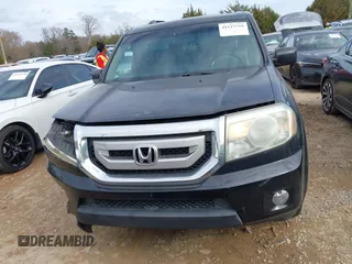 2011 Honda Pilot EX-L with VIN 5FNYF3H69BB043509, listed as a IAAI auction lot 41127719 with 241,167 mi miles and . Bid and sale history available at DreamBid. Image 12.