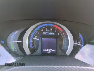 2010 Honda Insight LX with VIN JHMZE2H51AS011243, listed as a Copart auction lot 54445555 with 224,722 mi miles and Salvage Title. Bid and sale history available at DreamBid. Image 9.