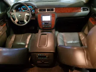 2013 Chevrolet Tahoe LT with VIN 1GNSKBE01DR288157, listed as a Copart auction lot 52665075 with 152,068 mi miles and Salvage Title. Bid and sale history available at DreamBid. Image 8.