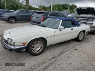 1989 Jaguar XJS z VIN SAJNV4849KC165599, wystawiony jako Copart lot #74244824 z przebiegiem 22 828 mil mil oraz Szkody całkowita. Historia ofert i sprzedaży dostępna na DreamBid. Obrazek 1.