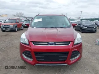 2016 Ford Escape Titanium with VIN 1FMCU9J92GUB13000, listed as a IAAI auction lot 41725258 with 66,817 mi miles. Bid and sale history available at carsss.com. Image 11.