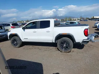 2024 GMC Canyon 4WD Elevation with VIN 1GTP6BEK9R1130353, listed as a IAAI auction lot 41967300 with 10,966 mi miles and . Bid and sale history available at carsss.com. Image 14.