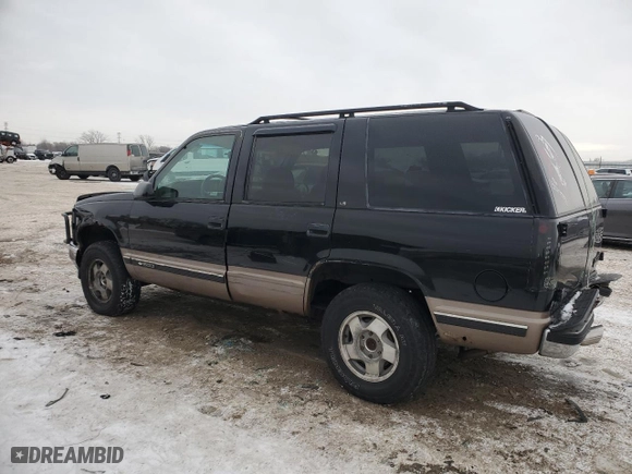 1996 Chevrolet Tahoe with VIN 1GNEK13R9TJ335411, listed as a Copart auction lot 87663725 with 111,802 mi miles and Salvage Title. Bid and sale history available at carsss.com. Image 2.