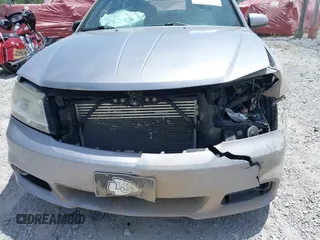2013 Dodge Avenger SXT with VIN 1C3CDZCGXDN741008, listed as a IAAI auction lot 42086508 with 124,596 mi miles and . Bid and sale history available at carsss.com. Image 6.