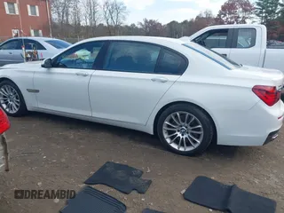 2015 BMW 7 Series 750Li xDrive with VIN WBAYF8C56FD654765, listed as a IAAI auction lot 40734550 with 133,848 mi miles and . Bid and sale history available at carsss.com. Image 14.