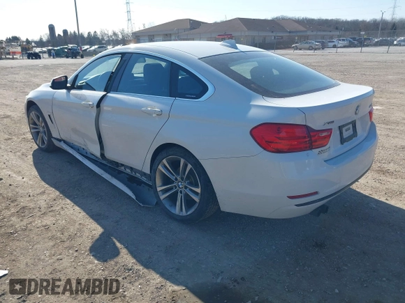 2016 BMW 4 Series 428i xDrive with VIN WBA4C9C59GG138090, listed as a IAAI auction lot 41560267 with 94,010 mi miles and . Bid and sale history available at carsss.com. Image 3.