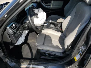2012 BMW 3 Series 335i with VIN WBA3A9C5XCF474803, listed as a Copart auction lot 57940675 with 121,960 mi miles and Salvage title. Bid and sale history available at DreamBid. Image 7.