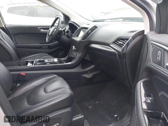 2019 Ford Edge Titanium with VIN 2FMPK4K99KBB56336, listed as a IAAI auction lot 42282600 with 52,422 mi miles and . Bid and sale history available at DreamBid. Image 5.