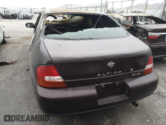 1998 Nissan Altima XE with VIN 1N4DL01D8WC266874, listed as a Copart auction lot 48636595 with 0 mi miles and Salvage Title. Bid and sale history available at carsss.com. Image 6.