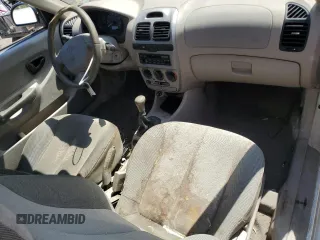 2003 Hyundai Accent с VIN KMHCF35C53U240220, выставлен на аукционе Copart как лот 52581415 с пробегом 102 322 миль миль и Списание • Salvage title. История ставок и продаж доступна на DreamBid. Изображение 8.