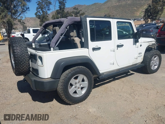 2007 Jeep Wrangler Unlimited X with VIN 1J4GB39147L133997, listed as a IAAI auction lot 41676009 with 110,849 mi miles and . Bid and sale history available at DreamBid. Image 4.